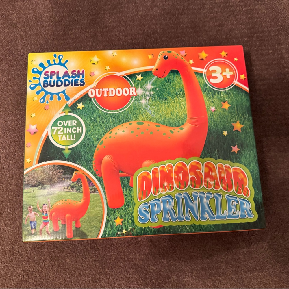 Brand new inflatable dinosaur sprinkler 6ft tall